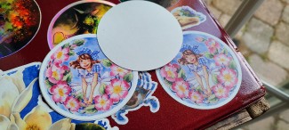 Back of vinyl sticker- paper backing that's removable.