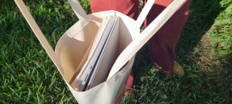 Interior shot of the bag to give you an idea of how much it can hold.  Inside is my laptop, a sketchbook, and my purse.