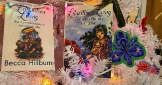 Both Lilliputian Living books in a white Christmas tree
